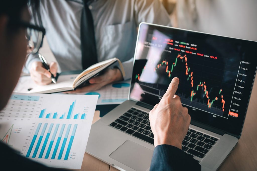 A woman studying her investment options