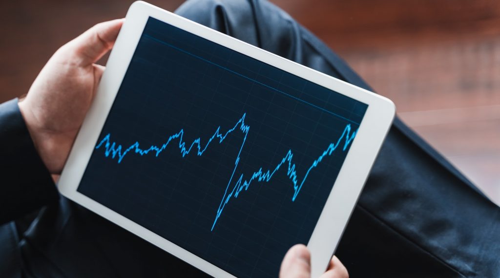 A man studying stock trends