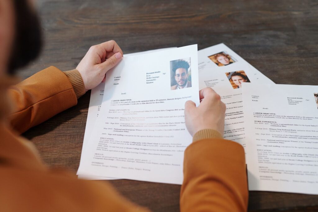 An HR reviewing resumes