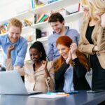 Employees celebrating after winning an office game