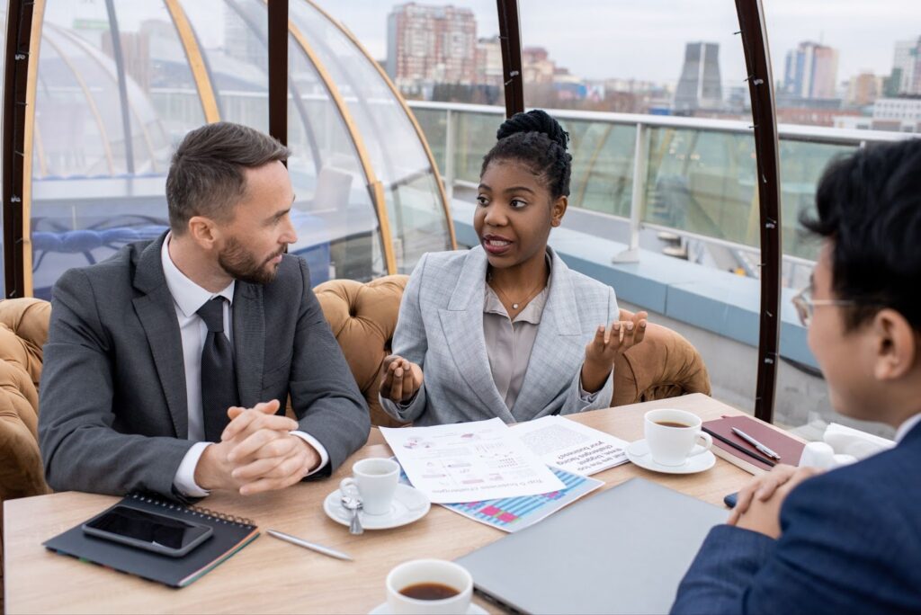 Insurance agents explaining business owned life insurance to a business owner